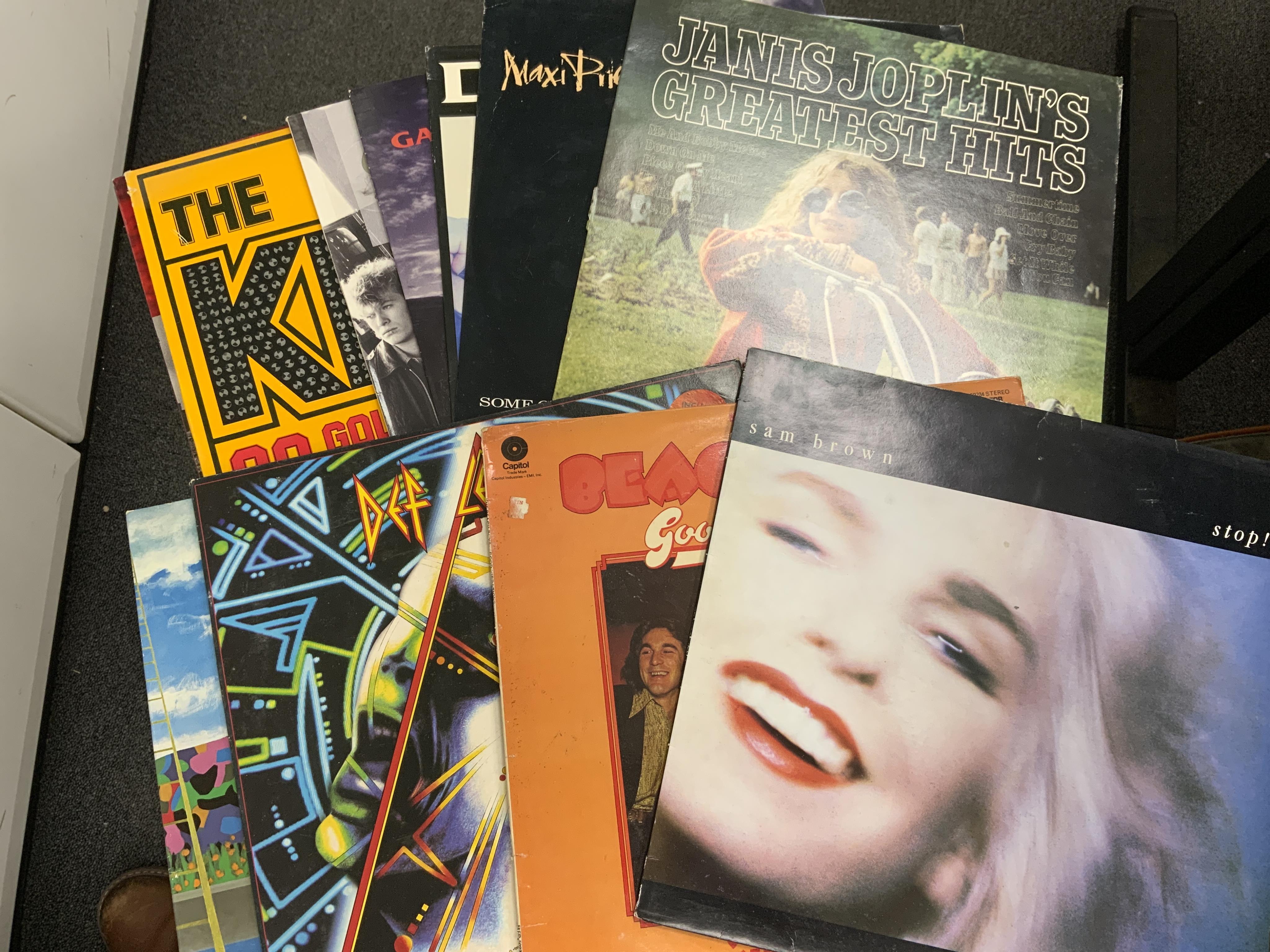 Seventy LP record albums, 12” singles, compilations, etc. artists including; David Bowie, Quireboys, Michael Jackson, ABBA, Blondie, The Clash, The Cure, Kylie Minogue, The Black Crowes, Skid Row, Def Leppard, Janis Jopl